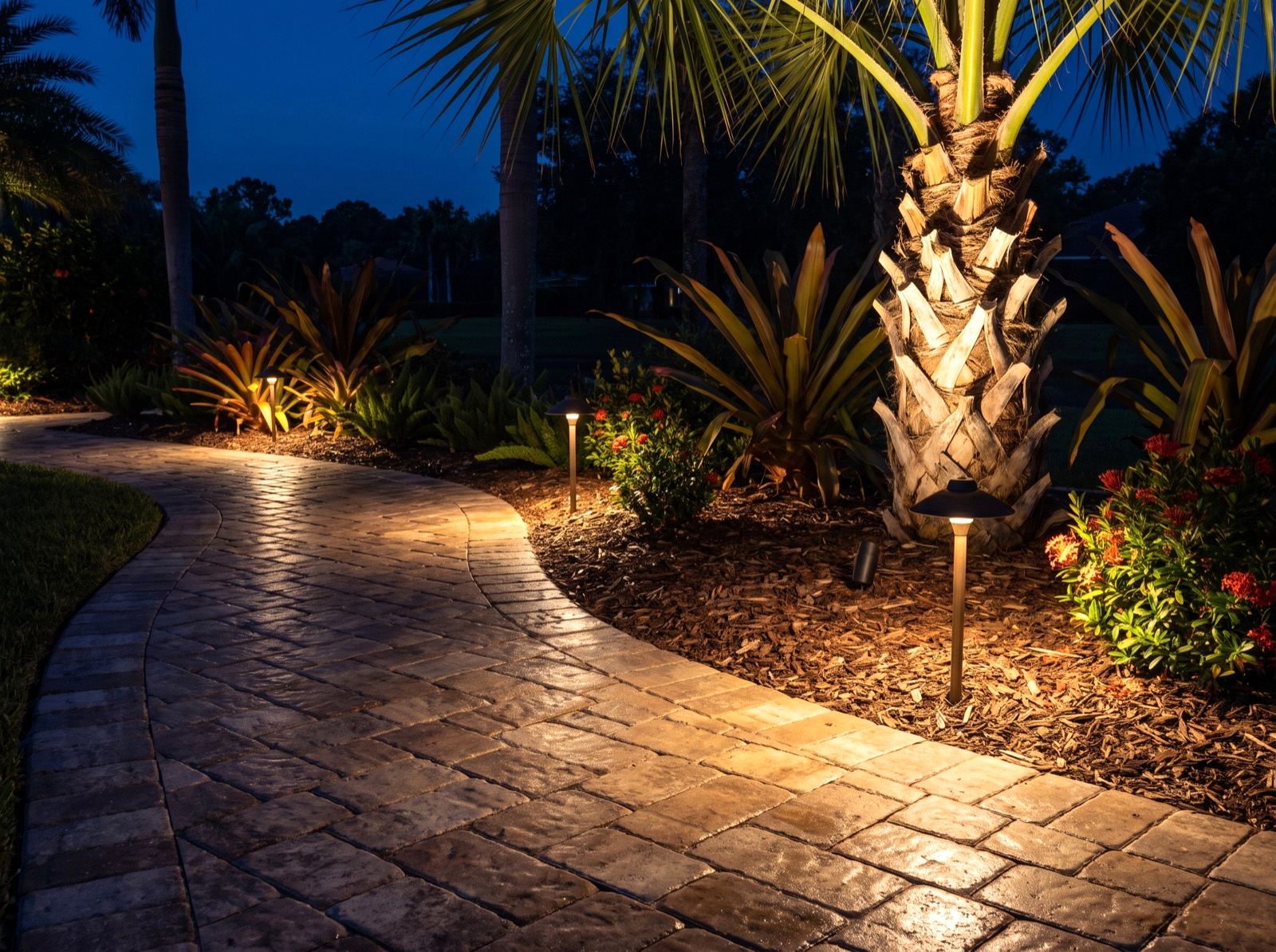 Warm 2700K lighting, plus the smart control, networking and outdoor audio that most landscape companies cannot install.